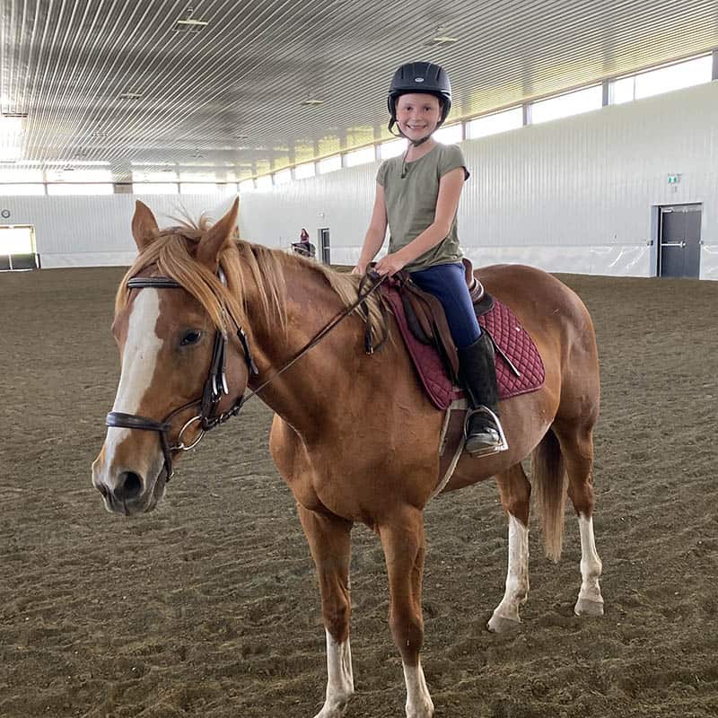 Girl Riding a Horse at Parkland Equestrian Centre