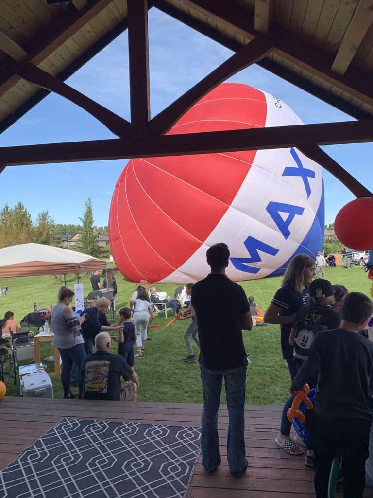 A Re/Max hot air balloon being inflated at Spring Lake Ranch on a weekend in September 14, 2019